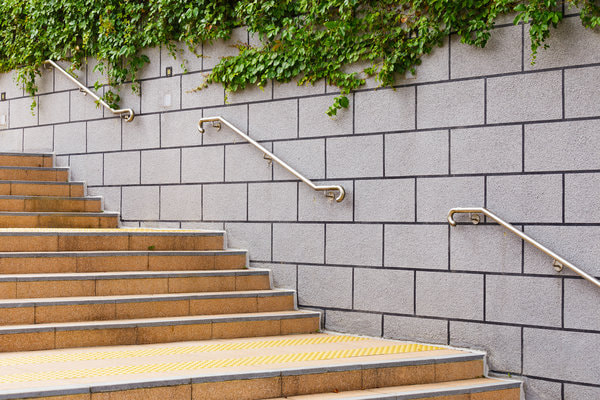 A large concrete retaining wall was built for a municipal staircase. This photo was taken in Vancouver.