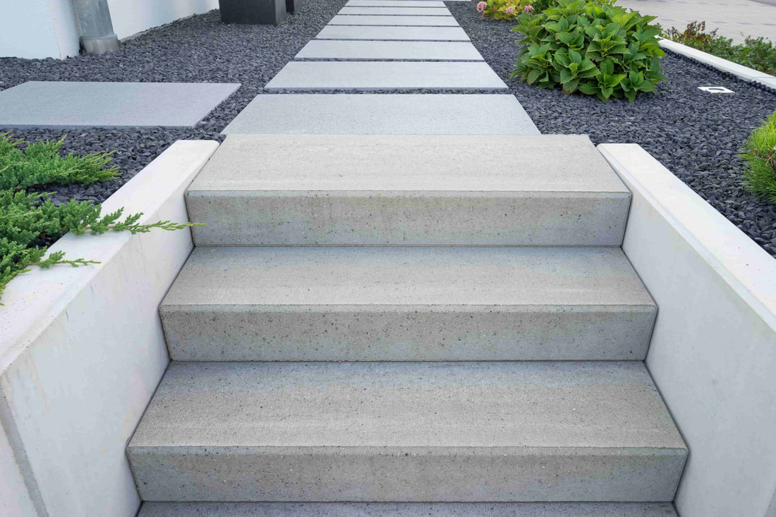 These modern concrete stairs complements the modern style of the home. The luxury home is based in Vancouver. 