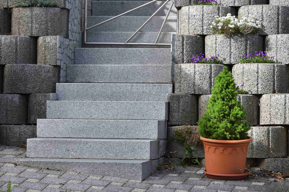 Decorative concrete was used to make these concrete stairs look like marble. This detached home is based in South Vancouver. 