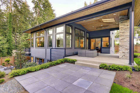 Stamped and broom concrete were the finishes chosen for this Vancouver homes patio.